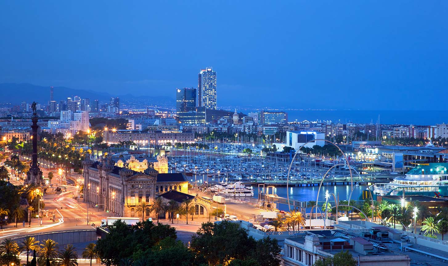 Barcelona, Spain skyline at night. Horbor view